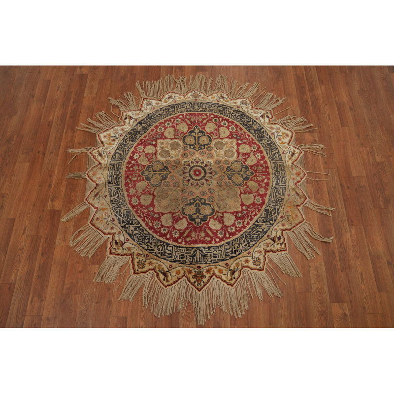 Tapis rond teint en soie antique