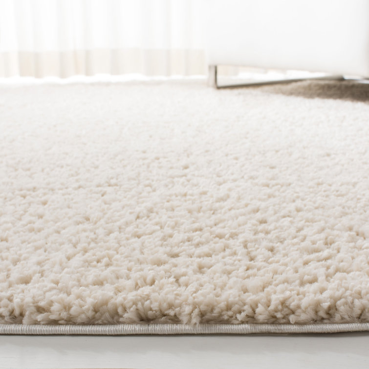 Brittney Performance solid color shag rug