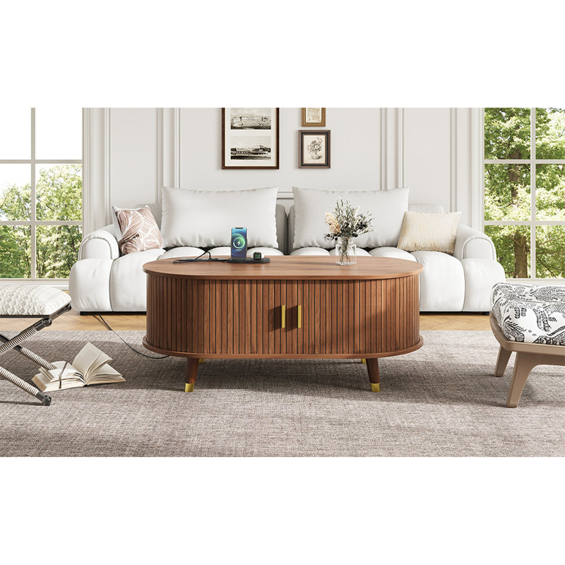 Table basse ovale cannelée Mid-Century en noyer avec station de charge, porte tambour 360 ° coulissante, pieds en bois massif pour des pièces confortables