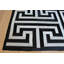 Tapis géométrique noir / crème en cuir de vache fait à la main-256006144