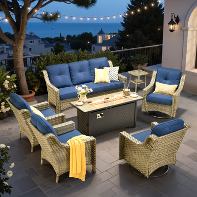 Ensemble de conversation d'extérieur en osier pour 7 personnes, canapé de patio et fauteuil pivotant avec foyer et coussins Emanuell