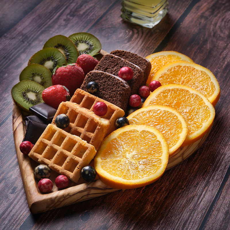 Assiette de service cœur en bois d'olivier 10 po