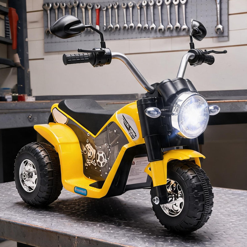 Moto pour enfant à 3 roues à batterie, PP / acier de couleur jaune, 28,25 L, capacité de 55 lb, tout-petit de 1 à 3 ans
