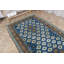 Tapis traditionnel turc avec des motifs rétro dans des tons riches et des textures moelleuses