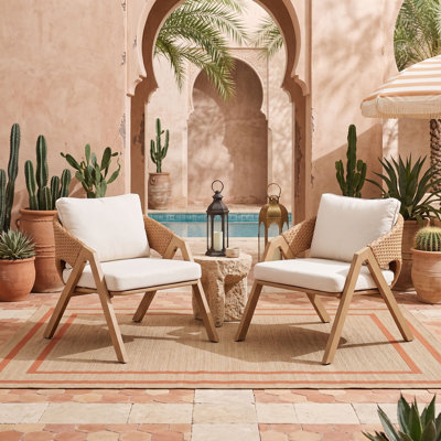 Ensemble de deux chaises de patio en rotin et osier avec coussins