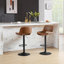 Raekwon Swivel Upholstered Faux Leather Adjustable Height Bar Stool with Iron Frame