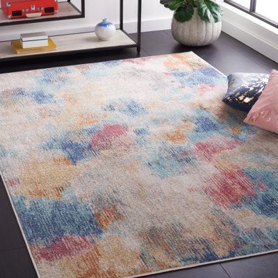 Tapis Graber Phoenix 508 en turquoise / rose doré