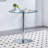 The modern and simple round glass dining table is equipped with silver-plated legs and is suitable for various scenarios