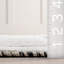 Tapis en coton et laine à pampilles Merrick-92543024