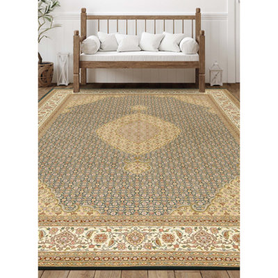 Tapis vert et ivoire noué à la main de haute qualité