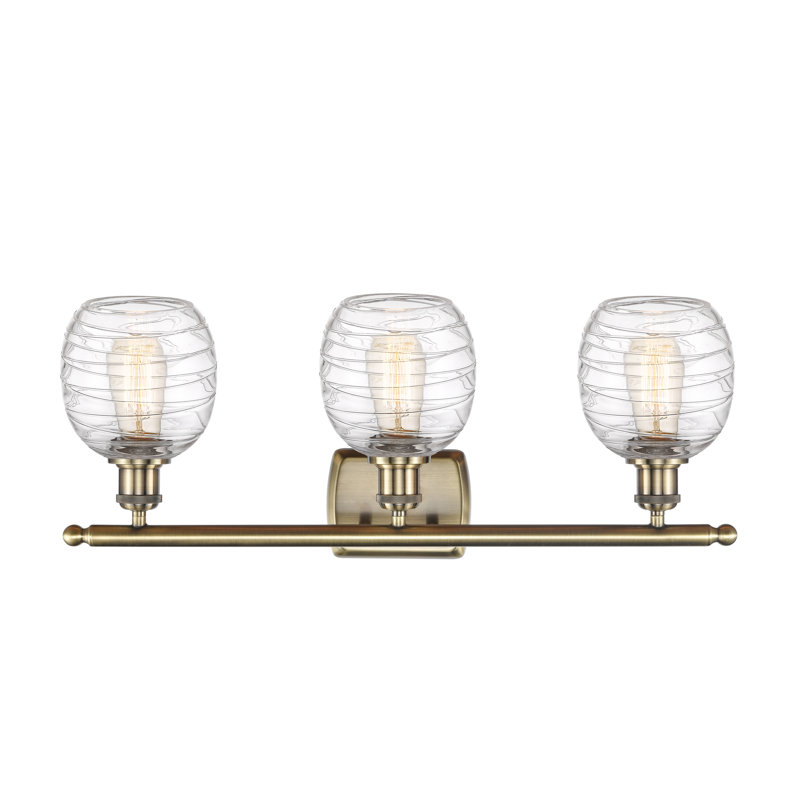 Carlucci 3 - Light Dimmable Vanity Light, 60 Watt Vintage Incandescent Bulb, Antique Brass, Clear Deco Swirl