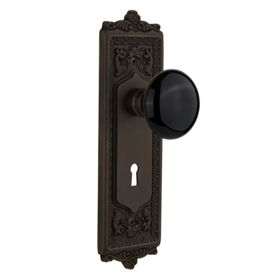 Egg & Dart Plate with Decorative Keyhole and Black Porcelain Door Knob