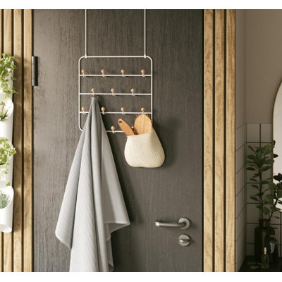 Hanger and multifunctional storage box above the door