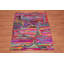 Tapis rose en coton touffeté fait main