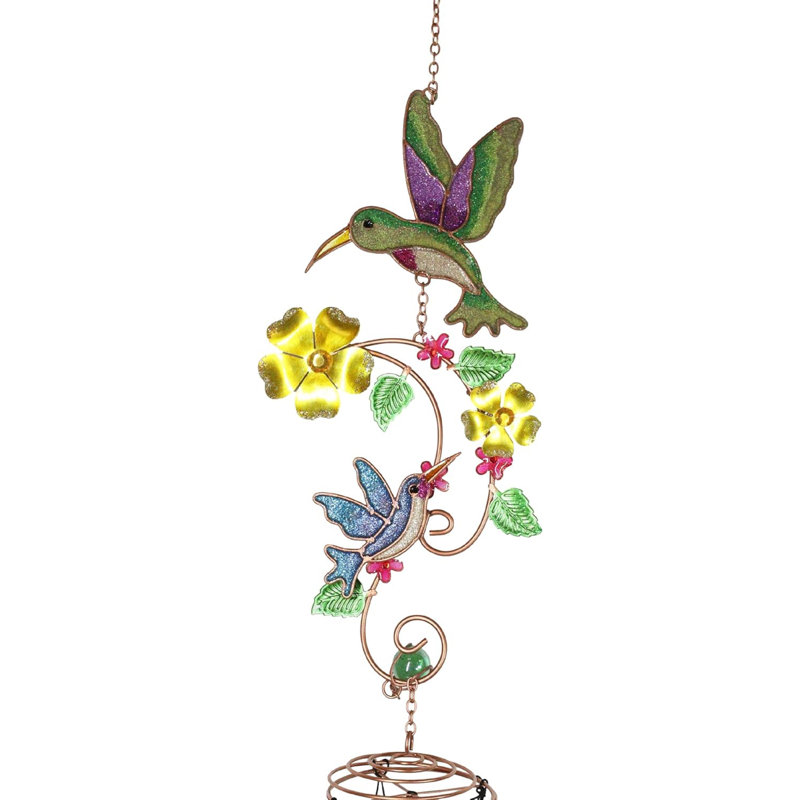 Colibris planant sur des fleurs de nectar