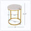 Table de bout, présente un design ajouré moderne et un style pointu, alliant style tendance et fonction essentielle en tant que table en forme de C.