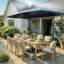 Parasol de patio à double face 15 pi x 9 pi avec système de brumisation et base-478510778