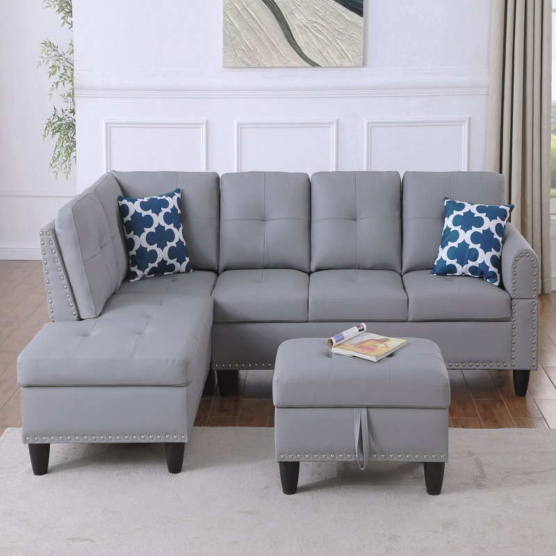 Canapé modulaire en similicuir avec repose-pieds