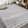 Tapis gris clair / crème