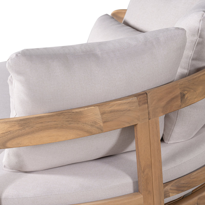 Lit de jour rond d'extérieur moderne Elara en bois d'acacia de 136 cm de large avec dossier incurvé, coussin épais et coussins décoratifs