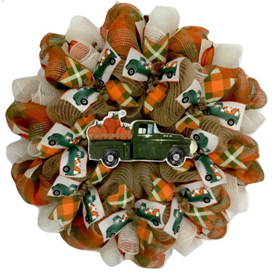 Camion à couronne de récolte avec citrouilles
