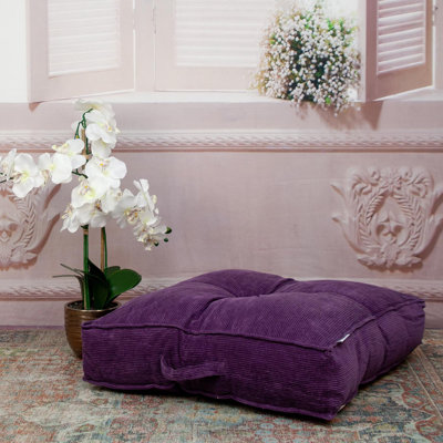 Coussin en velours côtelé