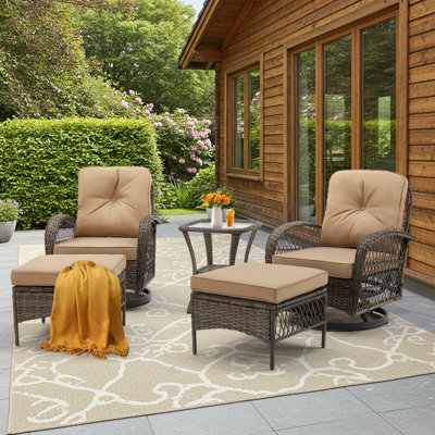 Ensemble de mobilier d'extérieur 5 pièces avec chaises berçantes pivotantes, repose-pieds et table basse en verre