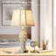 Lampe de table en résine Wellersburg USB