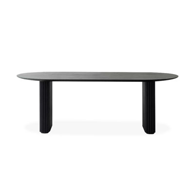 Black oval-shaped solid wood desk