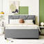 Lit plateforme tapissier avec tête de lit à motif brique et lit gigogne simple en lin gris pour une chambre à coucher relaxante