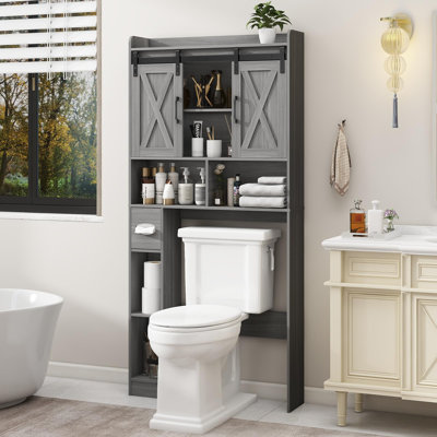 Armoire de rangement au-dessus de la toilette