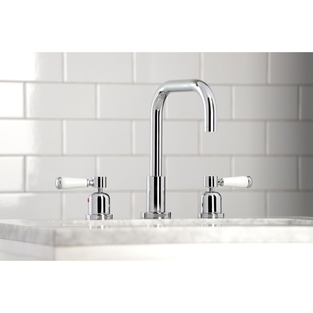 Kingston Brass Two-Handle 3-Hole Deck Mount Widespread Bathroom Faucet with Brass Pop-Up Drain Kingston Brass 