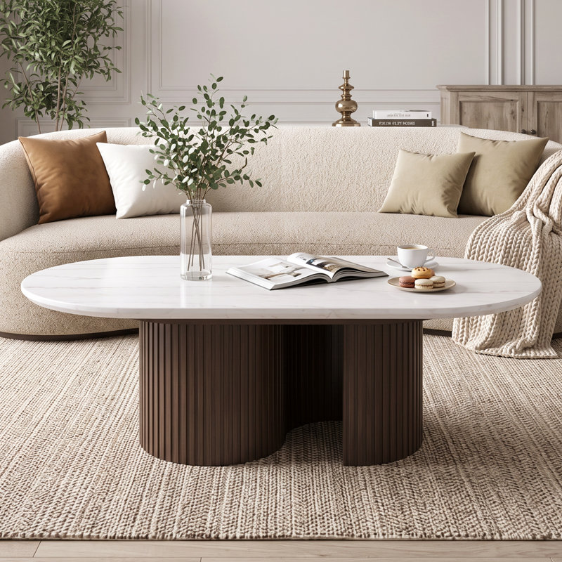 Table basse contemporaine en marbre ovale avec piédestal cannelé