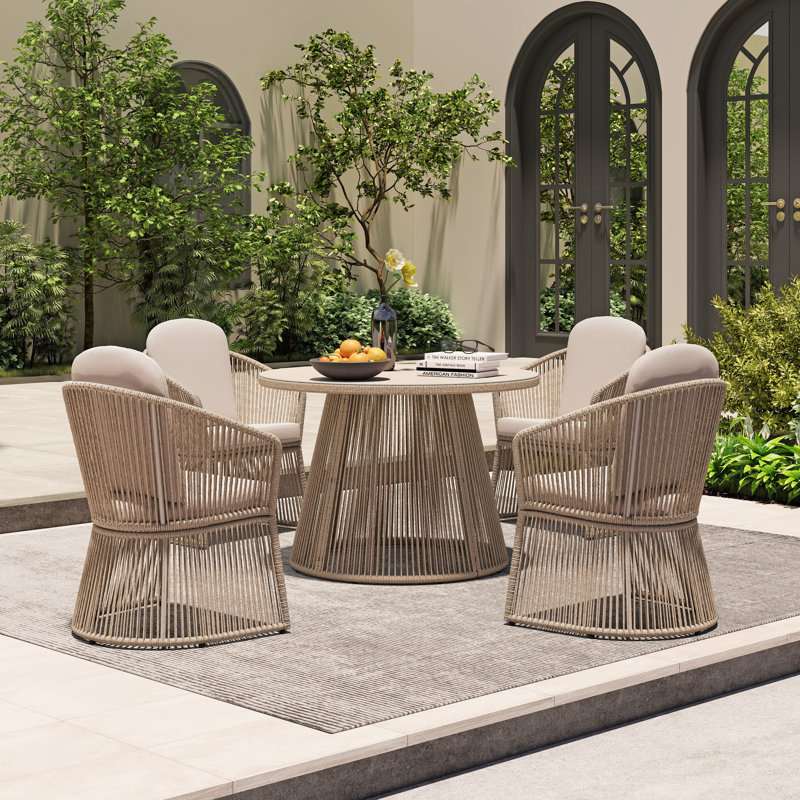 Outdoor Round 4 - Person 43.3" Long Dining Set With Cushions