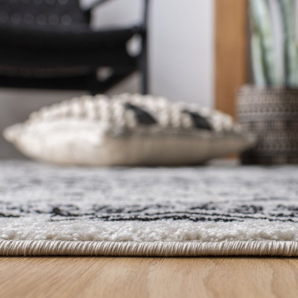 Canis Geometric Area Rug