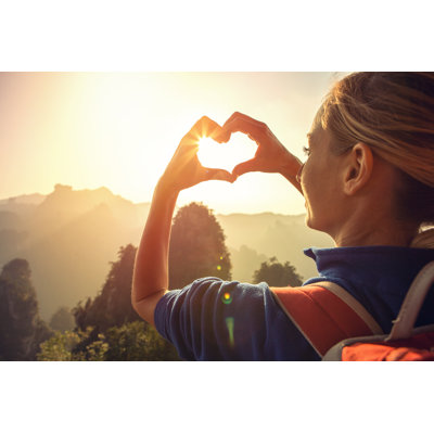 Young Woman Loving Nature by Swissmediavision