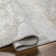 Abstract Machine Made Power Loomed Polypropylene Area Rug in Gray/Beige