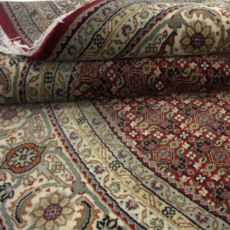 Kenlay Oriental Area Rug in Red