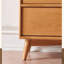 Armoire de rangement en rotin à deux portes avec tiroirs