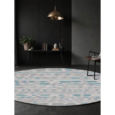 Tapis gris soyeux et moelleux