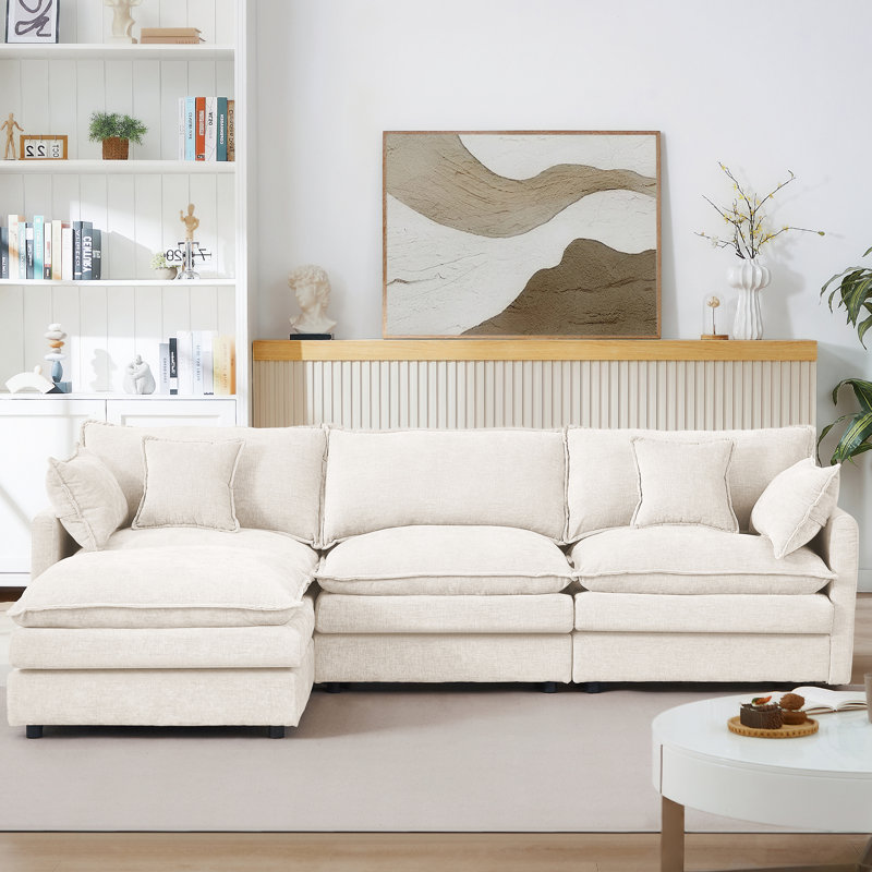 Canapé modulaire en L modulaire avec repose-pieds mobile pour un confort de salon personnalisable et des agencements de sièges flexibles.