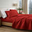 Ensemble de draps des Fêtes, motif de père Noël rouge, literie pour très grand lit-116478669-135514360