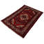 Poock Oriental Area Rug in Red