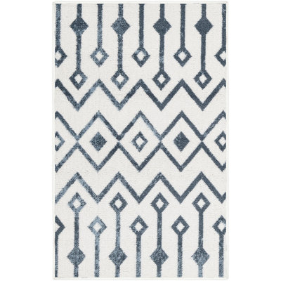 Tapis abstrait bleu marine / ivoire
