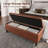 Madalie Faux Leather Upholstered Storage Bench-926094616