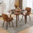 Dundrod Faux Leather Upholstered Swivel Dining Armchair-123200761