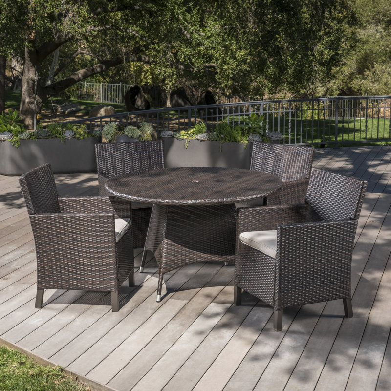 Basabi 4 - Person Patio Dining Set with Round Table , Cushions Included, Brown