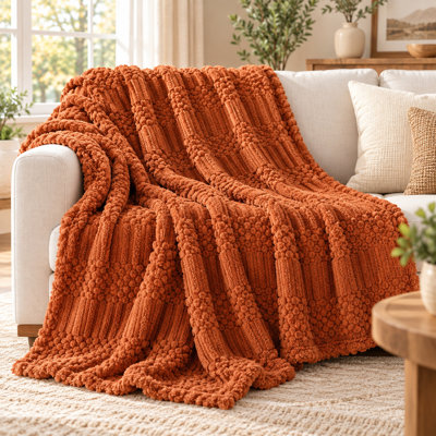 Jeté en molleton rouille avec motif bohème