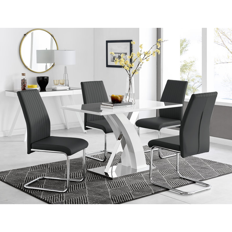 Ensemble de table de salle à manger Edzard en chrome et blanc ultrabrillant avec 4 chaises de salle à manger en similicuir de luxe