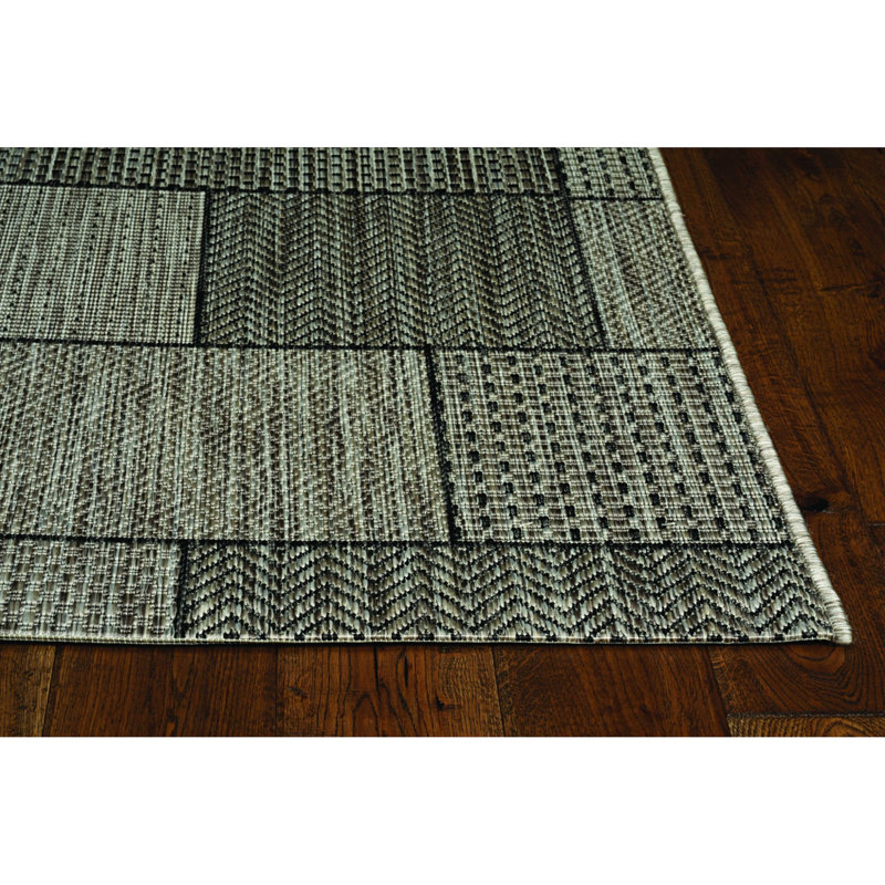 Tapis décoratif gris à motif géométrique Touffeté